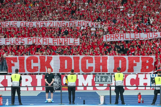 DFB Cup Final FC Bayern Munich VfB Stuttgart on 23 05 2026 at the Olympic Stadium in Berlin The fans of FC Bayern Munich Muenchen with a protest banner banner banner Fick dich DFB MH