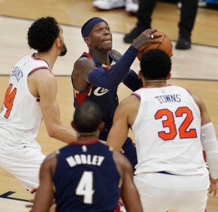 NBA, Basketball Herren, USA East Conference Finals Game 3 - New York Knicks at Cleveland Cavaliers Cleveland Cavaliers guard Dennis Schroder of Germany (C) looks to shoot as New York Knicks guard Landry Shamet (L) and New York Knicks center forward Karl-Anthony Towns (R) defend during game 3 of the NBA East Conference Finals between the Cleveland Cavaliers and the New York Knicks in Cleveland, Ohio, USA, 23 May 2026. Cleveland United States  Copyright: xDAVIDxMAXWELLx