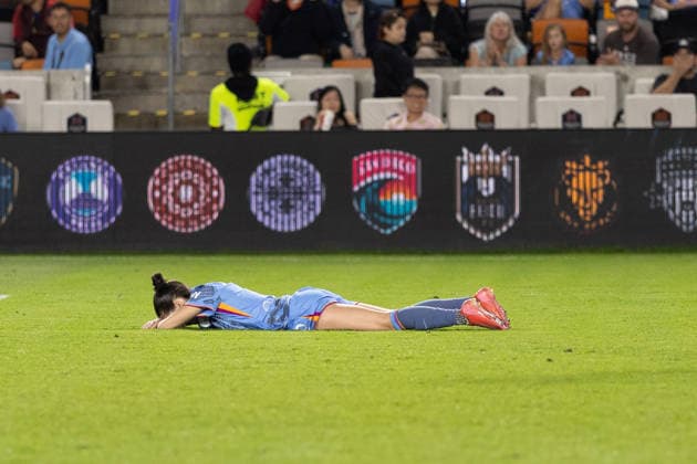 May 23, 2026, Houston, Texas, USA: Houston Dash forward KAT RADER (22) lays on the floor after a failed goal attempt during the second half of an NWSL match between Angel City FC and the Houston Dash on May 23, 2026, at Shell Energy Stadium in Houston, Texas. Houston USA - ZUMAg287 20260523_zsp_g287_038 Copyright: xMatthewxGuzmanx