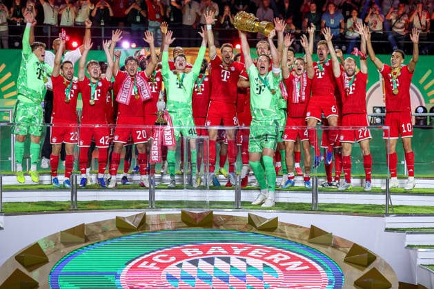 23 05 2026, Football, 83 DFB Pokal Final,, FC Bayern München VfB Stuttgart, Olympioastadion Berlin, Season 2025 2026 FC Bayern München is cup winner after the 3 0 victory Cup presentation ceremony Goalkeeper Manuel Neuer FC Bayern Muenchen 01 with the cup in his hand DFB regulations prohibit any use of photographs as image sequences and or quasi video Berlin Germany