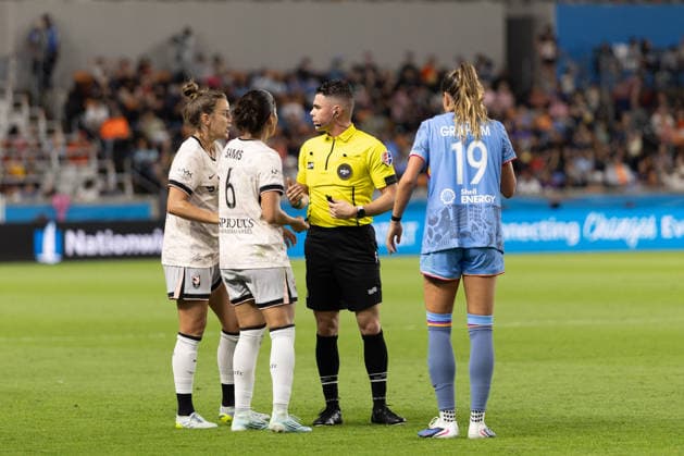 May 23, 2026, Houston, Texas, USA: Official talks to Houston Dash midfielder MAGGIE GRAHAM (19) and Angel City midfielder NEALY MARTIN (14) after a collision during the first half of an NWSL match between Angel City FC and the Houston Dash on May 23, 2026, at Shell Energy Stadium in Houston, Texas. Houston USA - ZUMAg287 20260523_zsp_g287_011 Copyright: xMatthewxGuzmanx