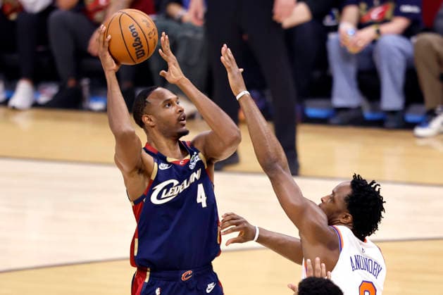 Cleveland Cavaliers Evan Mobley (4) shoots over New York Knicks OG Anunoby (8) during the first quarter of their Eastern Conference Final game in Cleveland, Ohio Saturday May 23, 2026.  CLE20260523122 AARONxJOSEFCZYK