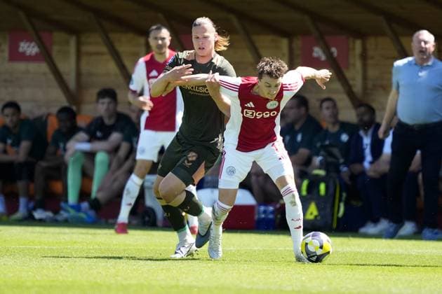 VOLENDAM , 24-05-2026 , Kras Stadium, season 2025 2026 , Play-offs for European football , Dutch Eredivisie Football . Match between Ajax and FC Utrecht , picture shows Ajax player Youri Baas , FC Utrecht player Niklas Vesterlund Ajax - Utrecht (play off)  x203934343x Copyright: