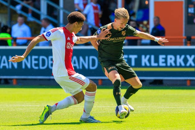 2026-05-24 AFC Ajax v FC Utrecht - Dutch Eredivisie Play-Offs VOLENDAM, NETHERLANDS - MAY 24: Jesper Karlsson of FC Utrecht, Aaron Bouwman of Ajax during the Dutch Eredivisie Play-Offs match between AFC Ajax and FC Utrecht at Kras Stadion on May 24, 2026 in Volendam, Netherlands. Volendam Kras Stadion Netherlands Content not available for redistribution in The Netherlands directly or indirectly through any third parties. Copyright: xMarcelxvanxPlateringenx