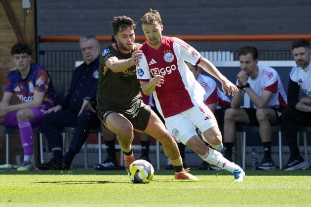 VOLENDAM , 24-05-2026 , Kras Stadium, season 2025 2026 , Play-offs for European football , Dutch Eredivisie Football . Match between Ajax and FC Utrecht , picture shows FC Utrecht player Souffian el Karouani , Ajax player Youri Regeer Ajax - Utrecht (play off)  x203934511x Copyright: