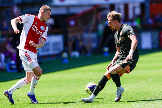 2026-05-24 AFC Ajax v FC Utrecht - Dutch Eredivisie Play-Offs VOLENDAM, NETHERLANDS - MAY 24: Anton Gaaei of AFC Ajax battles for possession with Mike Eerdhuijzen of FC Utrecht during the Dutch Eredivisie Play-Offs match between AFC Ajax and FC Utrecht at Kras Stadion on May 24, 2026 in Volendam, Netherlands. Volendam Kras Stadion Netherlands Content not available for redistribution in The Netherlands directly or indirectly through any third parties. Copyright: xBenxGalx