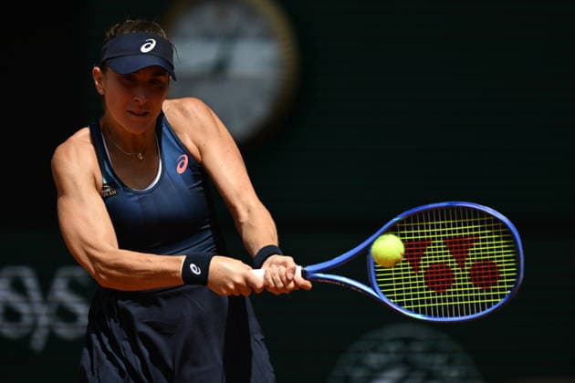 French Open (Roland Garros) - Day 1 PARIS, FRANCE - MAY 24: Belinda Bencic of Switzerland in action against Sinja Kraus of Austria (not seen) during a first-round women’s singles match on the first day of the French Open (Roland Garros) in Paris, France on May 24, 2026. Burak Akbulut Anadolu Paris France. Editorial use only. Please get in touch for any other usage.  Copyright: x2026xAnadoluxBurakxAkbulutx