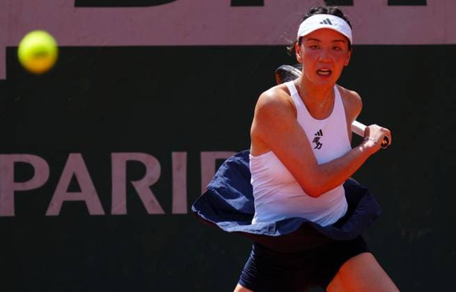 Xinyu Wang in first round action French Open Tennis, Day One, Tennis, Roland Garros, Paris, France - 24 May 2026Paris Roland Garros France EDITORIAL USE ONLY No use with unauthorised audio, video, data, fixture lists, club league logos or live services. Online in-match use limited to 120 images, no video emulation. No use in betting, games or single club league player publications.  Copyright: xJavierxGarcia Shutterstockx 16889883v