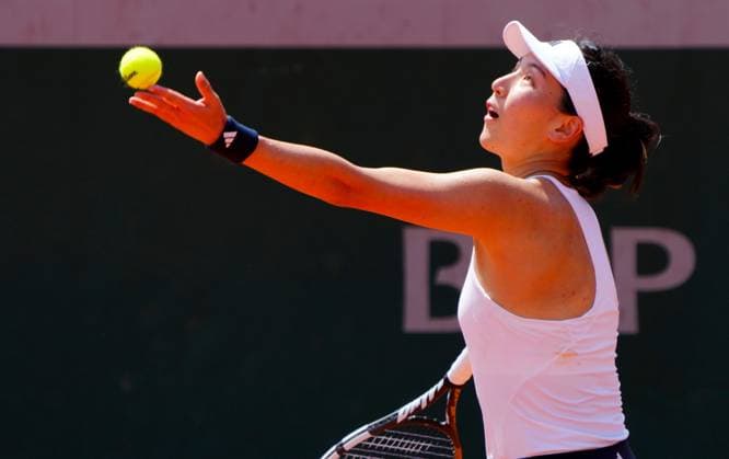 Xinyu Wang in first round action French Open Tennis, Day One, Tennis, Roland Garros, Paris, France - 24 May 2026Paris Roland Garros France EDITORIAL USE ONLY No use with unauthorised audio, video, data, fixture lists, club league logos or live services. Online in-match use limited to 120 images, no video emulation. No use in betting, games or single club league player publications.  Copyright: xJavierxGarcia Shutterstockx 16889883ab