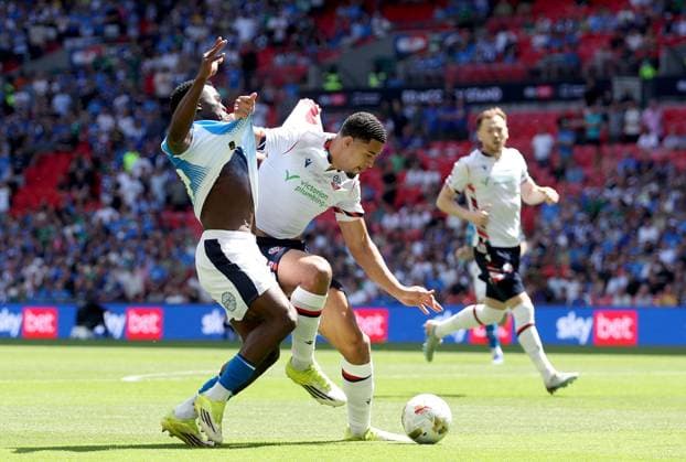 Adama Sidibeh of Stockport County in action against Chris Forino-Joseph of Bolton Wanderers Bolton Wanderers v Stockport County, EFL Sky Bet League One, Play-Off Final, Football, Wembley Stadium, London, UK - 24 May 2026London Wembley Stadium United Kingdom EDITORIAL USE ONLY No use with unauthorised audio, video, data, fixture lists, club league logos or live services. Online in-match use limited to 120 images, no video emulation. No use in betting, games or single club league player publications.  Copyright: xKieranxMcManus Shutterstockx 16889802by