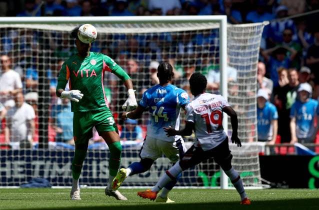 Corey Addai of Stockport County heads the ball away Bolton Wanderers v Stockport County, EFL Sky Bet League One, Play-Off Final, Football, Wembley Stadium, London, UK - 24 May 2026London Wembley Stadium United Kingdom EDITORIAL USE ONLY No use with unauthorised audio, video, data, fixture lists, club league logos or live services. Online in-match use limited to 120 images, no video emulation. No use in betting, games or single club league player publications.  Copyright: xSimonxDael Shutterstockx 16889811ek