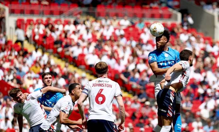 Kyle Wootton of Stockport County attempts a header on goal Bolton Wanderers v Stockport County, EFL Sky Bet League One, Play-Off Final, Football, Wembley Stadium, London, UK - 24 May 2026London Wembley Stadium United Kingdom EDITORIAL USE ONLY No use with unauthorised audio, video, data, fixture lists, club league logos or live services. Online in-match use limited to 120 images, no video emulation. No use in betting, games or single club league player publications.  Copyright: xSimonxDael Shutterstockx 16889811em
