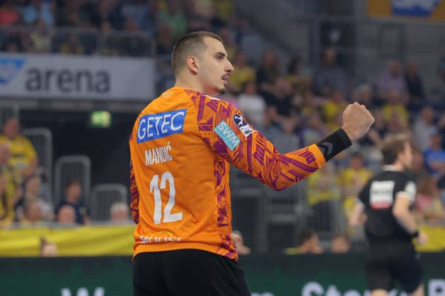 24 05 2026, xtgx, Handball, Daikin HBL, Rhein Neckar Löwen SC Magdeburg v l Matej Mandic Magdeburg, 12 cheers over held ball, defended, held, Torhueter Mannheim