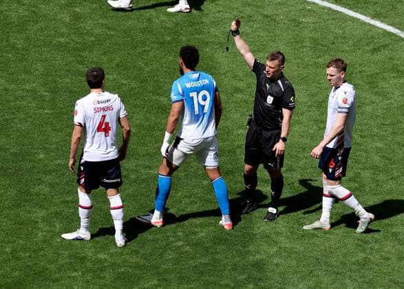 Referee Josh Smith shows a yellow card to Kyle Wootton of Stockport County Bolton Wanderers v Stockport County, EFL Sky Bet League One, Play-Off Final, Football, Wembley Stadium, London, UK - 24 May 2026London Wembley Stadium United Kingdom EDITORIAL USE ONLY No use with unauthorised audio, video, data, fixture lists, club league logos or live services. Online in-match use limited to 120 images, no video emulation. No use in betting, games or single club league player publications.  Copyright: xIanxTuttle Shutterstockx 16889808dc