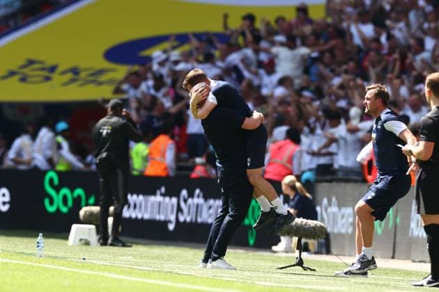 Bolton Wanderers manager Steven Schumacher and his staff celebrate the third goal scored by Sam Dalby of Bolton Wanderers 1-3 Bolton Wanderers v Stockport County, EFL Sky Bet League One, Play-Off Final, Football, Wembley Stadium, London, UK - 24 May 2026London Wembley Stadium United Kingdom EDITORIAL USE ONLY No use with unauthorised audio, video, data, fixture lists, club league logos or live services. Online in-match use limited to 120 images, no video emulation. No use in betting, games or single club league player publications.  Copyright: xJamesxMarsh Shutterstockx 16889809ce