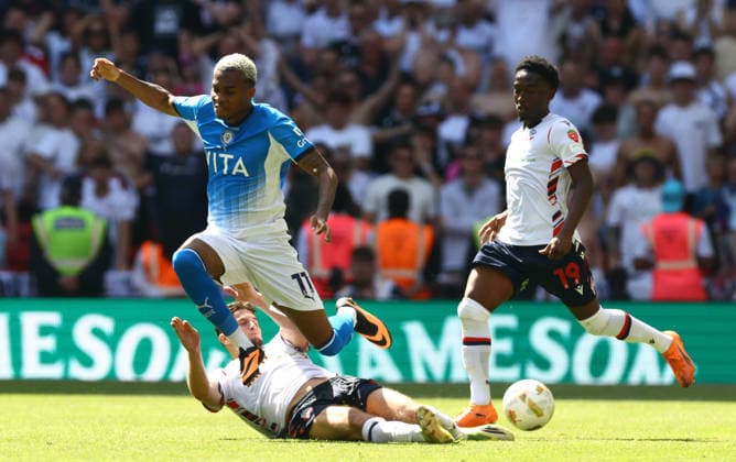 Malik Mothersille of Stockport County tackled by Ruben Rodrigues of Bolton Wanderers Bolton Wanderers v Stockport County, EFL Sky Bet League One, Play-Off Final, Football, Wembley Stadium, London, UK - 24 May 2026London Wembley Stadium United Kingdom EDITORIAL USE ONLY No use with unauthorised audio, video, data, fixture lists, club league logos or live services. Online in-match use limited to 120 images, no video emulation. No use in betting, games or single club league player publications.  Copyright: xJamesxMarsh Shutterstockx 16889809ci