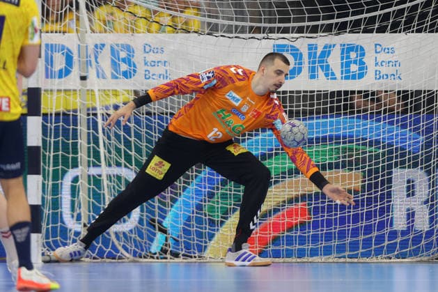 24 05 2026, xtgx, Handball, Daikin HBL, Rhein Neckar Löwen SC Magdeburg v l Matej Mandic Magdeburg, 12 Parade, holds the ball, catches the ball, parries Mannheim