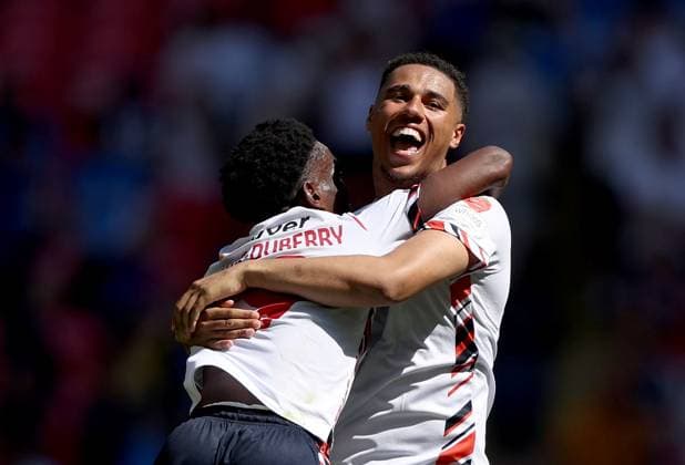 Amario Cozier-Duberry of Bolton Wanderers (left) and Ethan Erhahon of Bolton Wanderers celebrate after winning the Sky Bet EFL League One Play-off Final and promotion to the Sky Bet EFL Championship Bolton Wanderers v Stockport County, EFL Sky Bet League One, Play-Off Final, Football, Wembley Stadium, London, UK - 24 May 2026London Wembley Stadium United Kingdom EDITORIAL USE ONLY No use with unauthorised audio, video, data, fixture lists, club league logos or live services. Online in-match use limited to 120 images, no video emulation. No use in betting, games or single club league player publications.  Copyright: xKieranxMcManus Shutterstockx 16889802dt