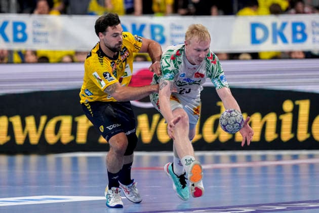 v li Dani Baijens RNL, 77 , Magnus Saugstrup SCM, 23 , duel, duel, tackle, tackling, dynamics, action, action, 24 05 2026, Mannheim Germany , Handball, Bundesliga, Rhein Neckar Löwen SC Magdeburg xozx