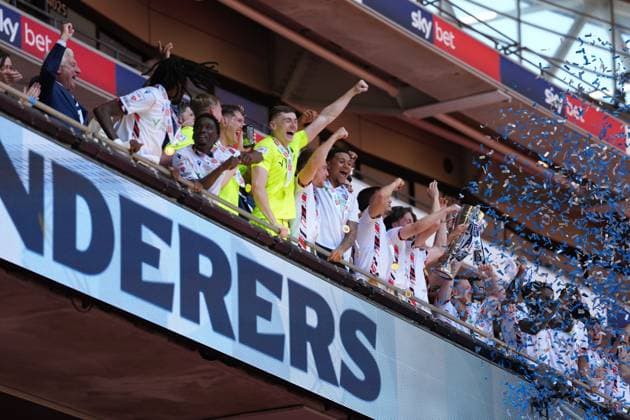 Bolton Wanderers fans celebrate in the Royal Box with the League one Play-off final trophy Bolton Wanderers v Stockport County, EFL Sky Bet League One, Play-Off Final, Football, Wembley Stadium, London, UK - 24 May 2026London Wembley Stadium United Kingdom EDITORIAL USE ONLY No use with unauthorised audio, video, data, fixture lists, club league logos or live services. Online in-match use limited to 120 images, no video emulation. No use in betting, games or single club league player publications.  Copyright: xJoexToth Shutterstockx 16889806ga