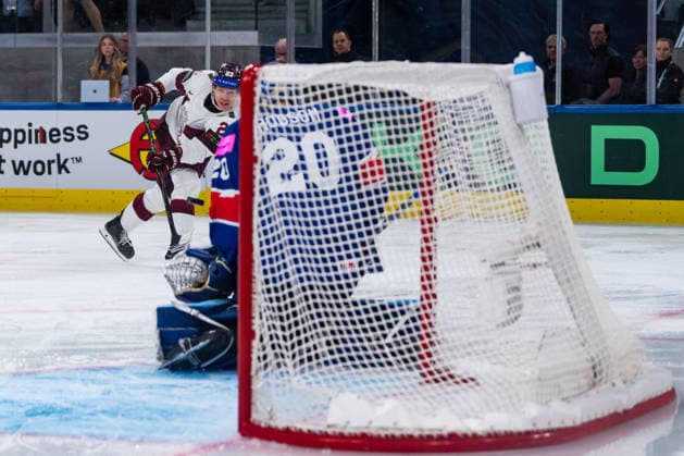 ZURICH, SWITZERLAND - MAY 24: Sandis Vilmanis (Latvia, 23) trying to score against Mat Robson (Great Britain, 20) during the Preliminary Round - Group A Match 43 between Great Britain and Latvia at the IIHF Ice hockey, Eishockey World Championship, WM, Weltmeisterschaft 2026, Swiss Life Arena on May 24, 2026 in Zurich, Switzerland. Zurich Switzerland Copyright: xTimoxSteinx