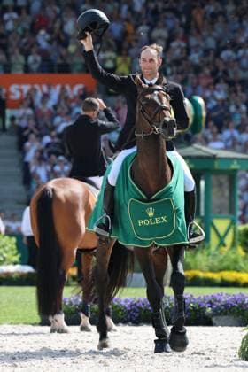 Winner, 1 place, Richard Vogel GER with horse United Touch S, Rolex Grand Slam of Show Jumping, award ceremony, pointing to his horse by Richard Vogel, show jumping competition with two rounds and jump-off, World Equestrian Festival, World Equestrian Festival, TSCHIO Aachen 2026, TSCHIO instead of CHIO 2026, Aachener Soers, May 22 to 24, 2026, equestrian sport, May 24, 2026, Aachener Soers Germany