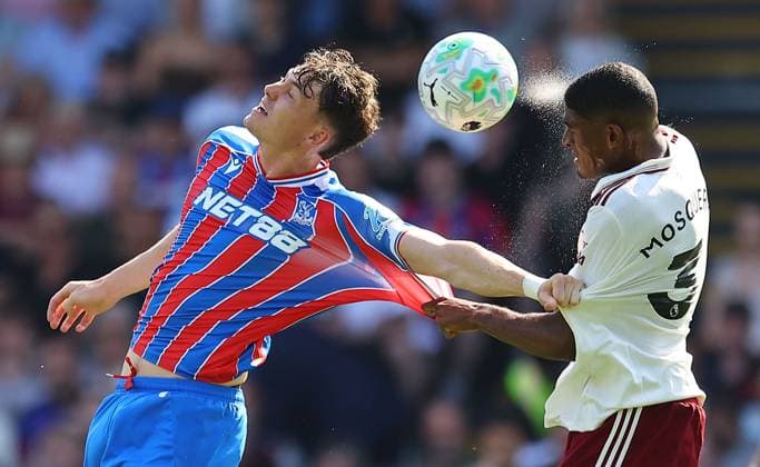 Jorgen Strand Larsen of Crystal Palace competes for the ball with Cristhian Mosquera of Arsenal Crystal Palace v Arsenal, Premier League, Football, Selhurst Park, London, UK - 24 May 2026London Selhurst Park United Kingdom EDITORIAL USE ONLY No use with unauthorised audio, video, data, fixture lists, club league logos or live services. Online in-match use limited to 120 images, no video emulation. No use in betting, games or single club league player publications.  Copyright: xMichaelxZemanek Shutterstockx 16889837ab