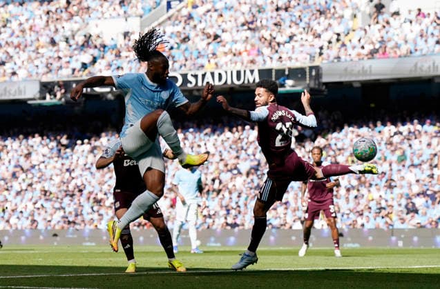 Manchester, England, 24th May 2026. Antoine Semenyo of Manchester City scoring the first goal during the Manchester City vs Aston Villa Premier League match at the Etihad Stadium, Manchester. Picture credit should read: Andrew Yates Sportimage EDITORIAL USE ONLY. No use with unauthorised audio, video, data, fixture lists, club league logos or live services. Online in-match use limited to 120 images, no video emulation. No use in betting, games or single club league player publications. SPI_031_AY_Man_City_Villa SPI-4819-0036