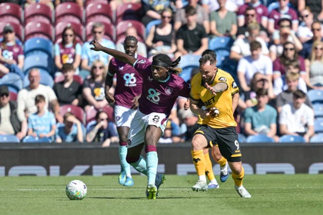 24th May 2026; Turf Moor, Burnley, Lancashire, England; Premier League Football, Burnley versus Wolverhampton Wanderers; Adam Armstrong of Wolverhampton Wanderers pressures Lesley Ugochukwu of Burnley for the ball LeexDurkin