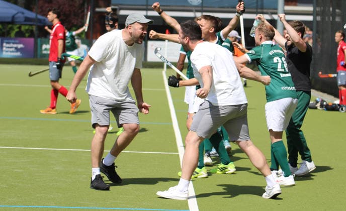 Mens Field Hockey Bundesliga HTCU coach Thilo Stralkowski celebrates the 5-4 victory in the decisive third quarter-final match at the Club an der Alster with an assistant after the final whistle