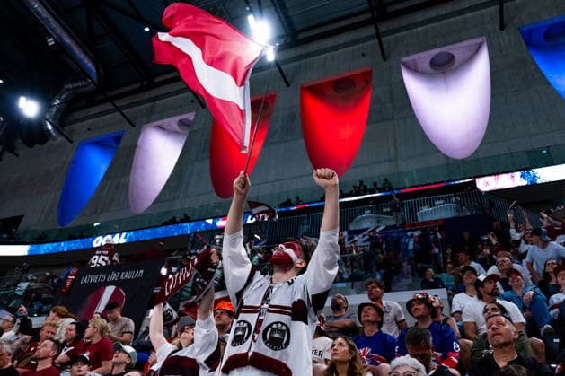 ZURICH, SWITZERLAND - MAY 24: Latvian Fans cheering for their team after the 6:0 goal from Renars Krastenbergs (Latvia, 9) during the Preliminary Round - Group A Match 43 between Great Britain and Latvia at the IIHF Ice hockey, Eishockey World Championship, WM, Weltmeisterschaft 2026, Swiss Life Arena on May 24, 2026 in Zurich, Switzerland. Zurich Switzerland Copyright: xTimoxSteinx
