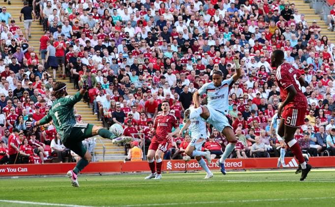 Liverpool s Alisson Becker saves from Brentford s Kevin Schade Liverpool v Brentford, Premier League, Football, Anfield, Liverpool, UK - 24 May 2026Liverpool Anfield United Kingdom EDITORIAL USE ONLY No use with unauthorised audio, video, data, fixture lists, club league logos or live services. Online in-match use limited to 120 images, no video emulation. No use in betting, games or single club league player publications.  Copyright: xAlexxDodd Shutterstockx 16889846ab