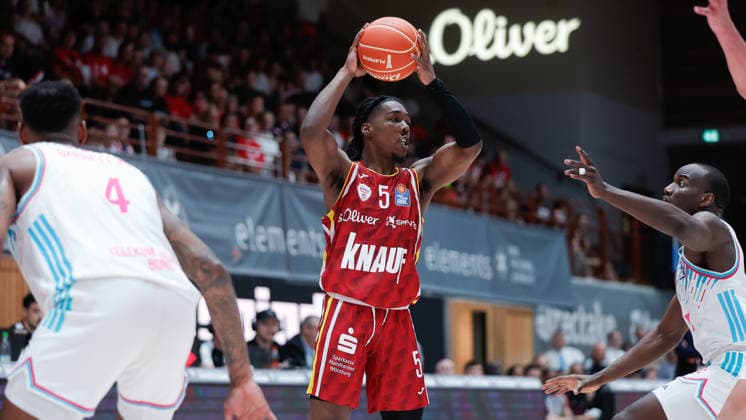 In the picture from left Jeff Garrett Jr Telekom Baskets Bonn, 4 m Marcus Carr Wuerzburg Baskets, 5 on the ball and Tyler Birts Telekom Baskets Bonn, 5 24 05 2026, Basketball, Fitness First Wuerzburg Baskets vs Telekom Baskets Bonn, easyCredit BBL Playoffs, 4 Quarterfinals, Germany, 97072, tectake Arena Wuerzburg, Copyright: HMBxMedia xJulienxBecker