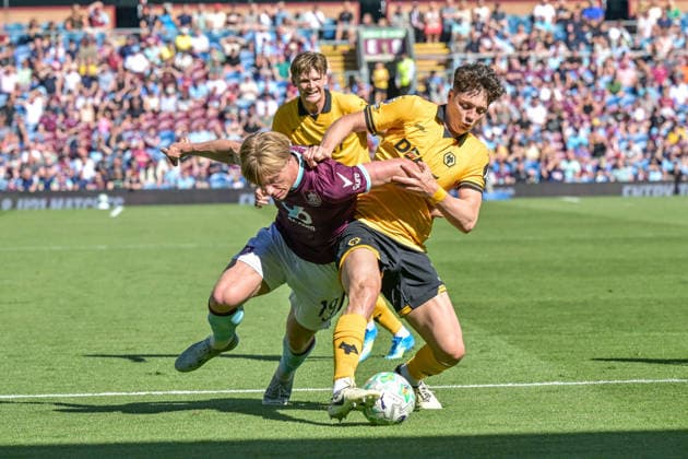 24th May 2026; Turf Moor, Burnley, Lancashire, England; Premier League Football, Burnley versus Wolverhampton Wanderers; Ladislav Krejci of Wolverhampton Wanderers tussles with Zian Flemming of Burnley during the challenge LeexDurkin