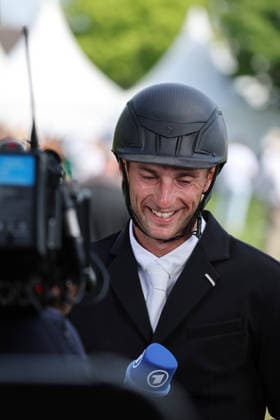 Winner, 1 place, interview with WDR, ARD, microphone ARD, Richard Vogel GER with horse United Touch S, winner interview, Rolex Grand Slam of Show Jumping, show jumping competition with two rounds and jump-off, World Equestrian Festival, World Equestrian Festival, TSCHIO Aachen 2026, TSCHIO instead of CHIO 2026, Aachener Soers, May 22 to 24, 2026, equestrian sport, May 24, 2026, Aachener Soers Germany