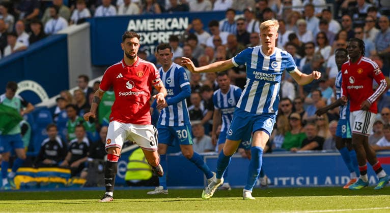 Bruno Fernandes of Manchester United, ManU on the left with Jan Paul van Hecke of Brighton during the Premier League match between Brighton and Hove Albion and Manchester United at the American Express Stadium , Brighton , UK - 24th May 2026 Brighton & Hove Albion vs Manchester United Premier League Football, Amex Stadium, Sussex, United Kingdom - 24 May 2026Brighton Amex Stadium Sussex United Kingdom EDITORIAL USE ONLY No use with unauthorised audio, video, data, fixture lists, club league logos or live services. Online in-match use limited to 120 images, no video emulation. No use in betting, games or single club league player publications. . No mer  Copyright: xSimonxDack TPI Shutterstockx 16895822af