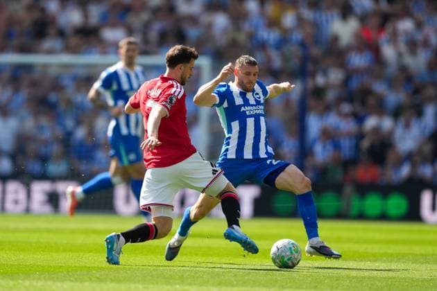 Mason Mount of Manchester United, ManU and James Milner of Brighton during the game. Brighton and Hove Albion v Manchester United, Premier League, Football, American Express Community Stadium, Brighton, UK - 24 May 2026Brighton American Express Community Stadi United Kingdom EDITORIAL USE ONLY No use with unauthorised audio, video, data, fixture lists, club league logos or live services. Online in-match use limited to 120 images, no video emulation. No use in betting, games or single club league player publications.  Copyright: xSeanxRyan Shutterstockx 16889822ac