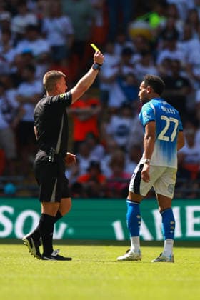 LONDON, ENGLAND - MAY 24: Odin Bailey of Stockport County receives a yellow card during the Sky Bet League One Play-Off Final match between Bolton Wanderers and Stockport County at Wembley Stadium on May 24, 2026 in London, England.  Copyright: xMBxMediax