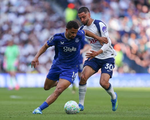 LONDON, ENGLAND - MAY 24: Iliman Ndiaye of Everton on the ball is pressured by Rodrigo Bentancur of Tottenham Hotspur during the Premier League match between Tottenham Hotspur and Everton at Tottenham Hotspur Stadium on May 24, 2026 in London, England.  Copyright: xJayxPatel SPPx Sportspressphoto_154071