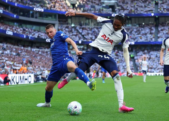24th May 2026; Tottenham Hotspur Stadium, London, England; Premier League Football, Tottenham Hotspur versus Everton; Djed Spence of Tottenham Hotspur under pressure from Vitaliy Mykolenko of Everton JPxFletcher