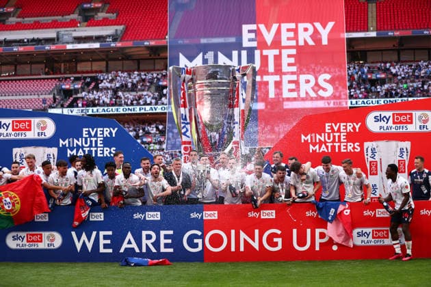 London, England, 24th May 2026. Bolton Wanderers lift the trophy during the Bolton Wanderers vs Stockport County Sky Bet League 1 play off final match at Wembley Stadium, London. Picture credit should read: Jake Youle Sportimage EDITORIAL USE ONLY. No use with unauthorised audio, video, data, fixture lists, club league logos or live services. Online in-match use limited to 120 images, no video emulation. No use in betting, games or single club league player publications. SPI_026_JY_Stockport_County_Bolton_Wanderers SPI-4821-0026