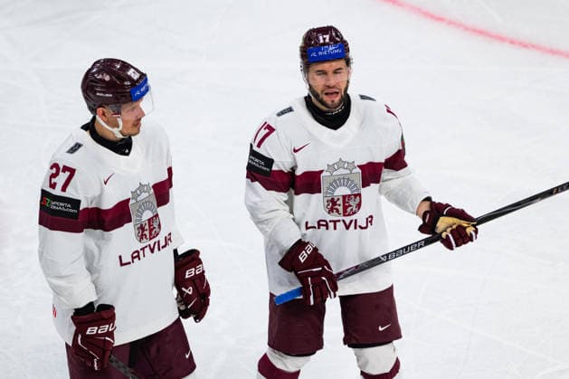 ZURICH, SWITZERLAND - MAY 24: Martins Dzierkals (Latvia, 17) and Oskars Cibulskis (Latvia, 27) during the Preliminary Round - Group A Match 43 between Great Britain and Latvia at the IIHF Ice hockey, Eishockey World Championship, WM, Weltmeisterschaft 2026, Swiss Life Arena on May 24, 2026 in Zurich, Switzerland. Zurich Switzerland Copyright: xTimoxSteinx