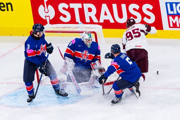 ZURICH, SWITZERLAND - MAY 24: -95lat trying to get the puck during the Preliminary Round - Group A Match 43 between Great Britain and Latvia at the IIHF Ice hockey, Eishockey World Championship, WM, Weltmeisterschaft 2026, Swiss Life Arena on May 24, 2026 in Zurich, Switzerland. Zurich Switzerland Copyright: xTimoxSteinx