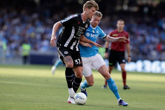 Italy: Serie a football match SSC Napoli vs Udinese Udinese s Danish defender Thomas Thiesson Kristensen challenges for the ball with Napoli s Belgian midfielder Kevin De Bruyne during the Serie A football match between SSC Napoli and Udinese at the Diego Armando Maradona Stadium in Naples, on May 24, 2026. _BPH2589 Copyright: xAntonioxBalascox