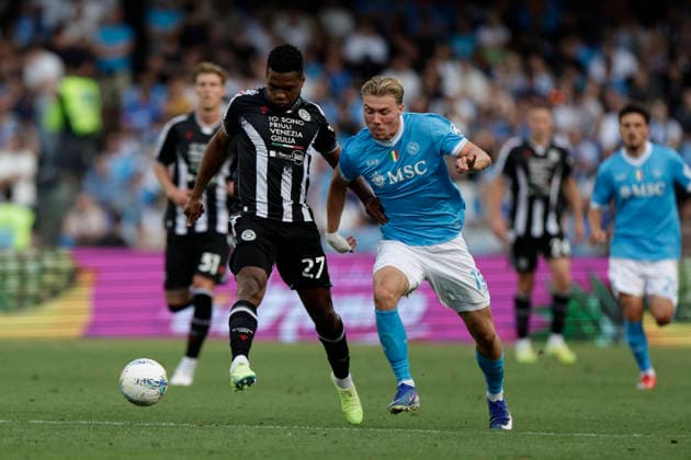 Italy: Serie a football match SSC Napoli vs Udinese Udinese s Belgian defender Christian Kabasele challenges for the ball with Napoli s Danish forward Rasmus Hojlund during the Serie A football match between SSC Napoli and Udinese at the Diego Armando Maradona Stadium in Naples, on May 24, 2026. _BPH2919 Copyright: xAntonioxBalascox