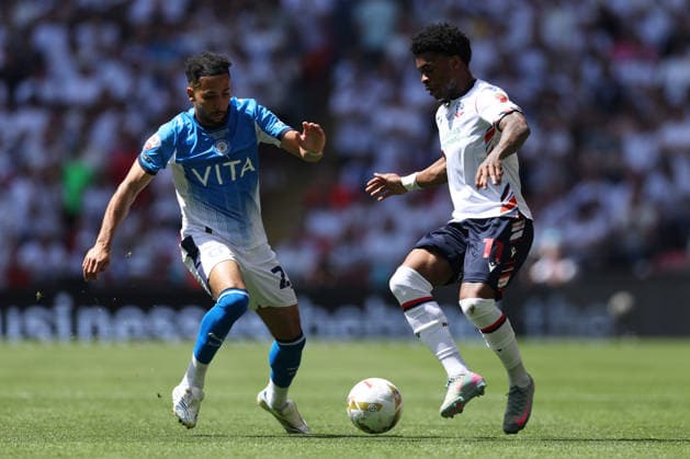 Bolton Wanderers v Stockport County - Sky Bet League One Play-Off Final Josh Dacres-Cogley of Stockport County pressures Thierry Gale of Bolton Wanderers during the Sky Bet League 1 Play Off Final match between Bolton Wanderers and Stockport County at Wembley Stadium in London on May 24, 2026. London Greater London United Kingdom  Copyright: xMIxNewsx originalFilename:fletcher-boltonwa260524_npKtg.jpg