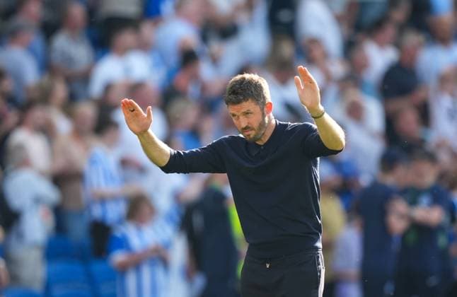 Michael Carrick manager of Manchester United, ManU bows to the travelling fans at the end of the game. Brighton and Hove Albion v Manchester United, Premier League, Football, American Express Community Stadium, Brighton, UK - 24 May 2026Brighton American Express Community Stadi United Kingdom EDITORIAL USE ONLY No use with unauthorised audio, video, data, fixture lists, club league logos or live services. Online in-match use limited to 120 images, no video emulation. No use in betting, games or single club league player publications.  Copyright: xSeanxRyan Shutterstockx 16889822bm