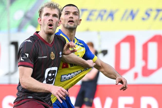 Mechelen s Bouke Boersma and STVV s Visar Musliu pictured in action during a soccer match between Sint-Truiden VV and KV Mechelen, Sunday 24 May 2026 in Sint-Truiden, on the last day of the Champion s Play-offs of the 2025-2026 Jupiler Pro League first division of the Belgian championship. JILLxDELSAUX  x174940516x