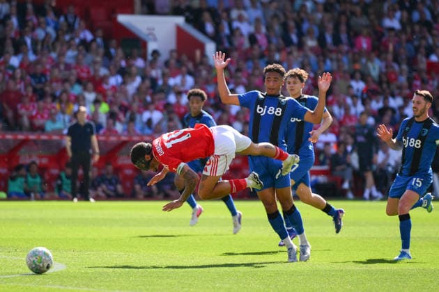 Nottingham Forest v Bournemouth - Premier League James Hill of Bournemouth fouls Morgan Gibbs-White of Nottingham Forest during the Premier League match between Nottingham Forest and Bournemouth at the City Ground in Nottingham, United Kingdom, on May 24, 2026. Nottingham Nottinghamshire United Kingdom  Copyright: xMIxNewsx originalFilename:fletcher-nottingh260524_nppdE.jpg