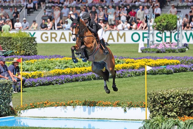 Sophie Hinners GER with horse Iron Dames Singclair at the moat, Rolex Grand Slam of Show Jumping, show jumping competition with two rounds and jump-off, World Equestrian Festival, TSCHIO Aachen 2026, TSCHIO instead of CHIO 2026, Aachener Soers, 22 to 24 May 2026, equestrian sport, 24 May 2026, Aachener Soers Germany